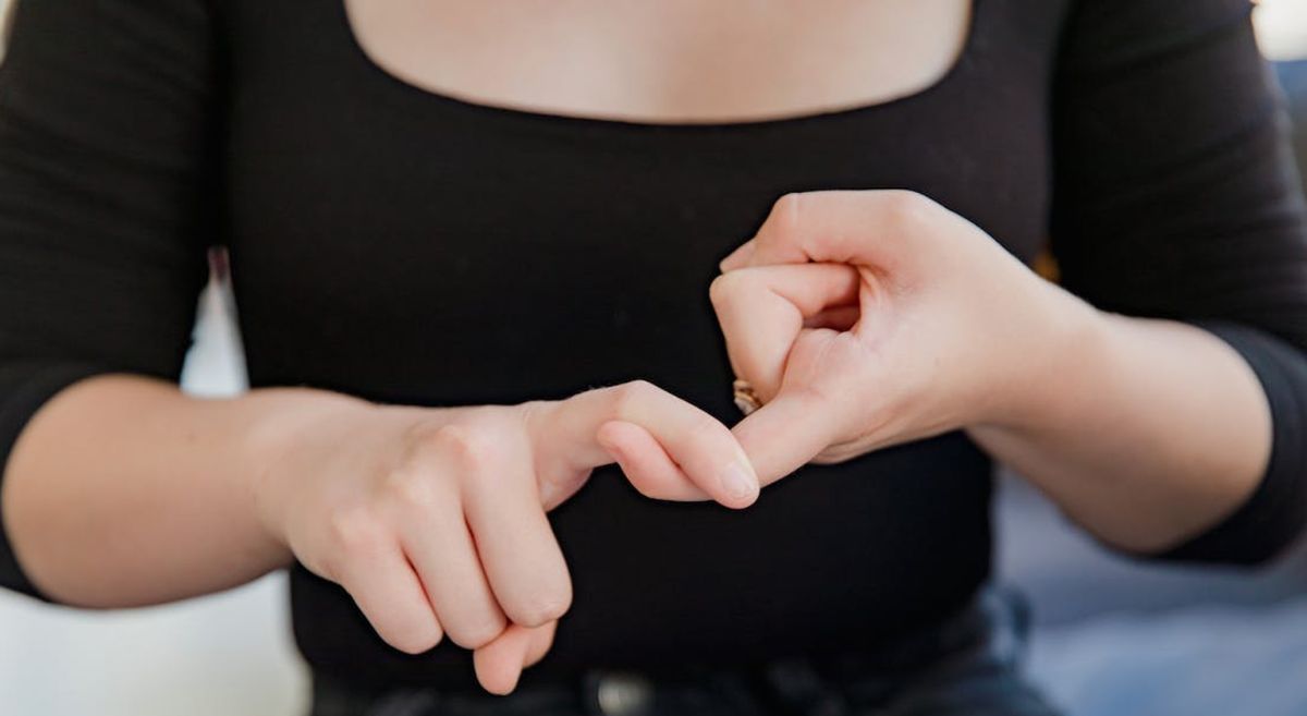 Picture of a person using sign language